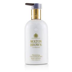 Molton Brown By Molton Brown for Women. Mesmerising Oudh Accord & Gold Body Lotion (300ml/10oz) | Perfumepur.com